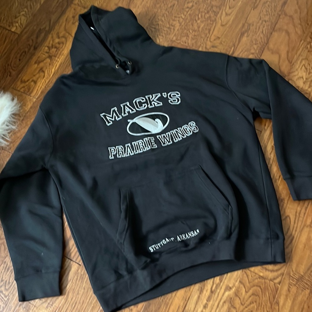 Mack’s black hoodie.